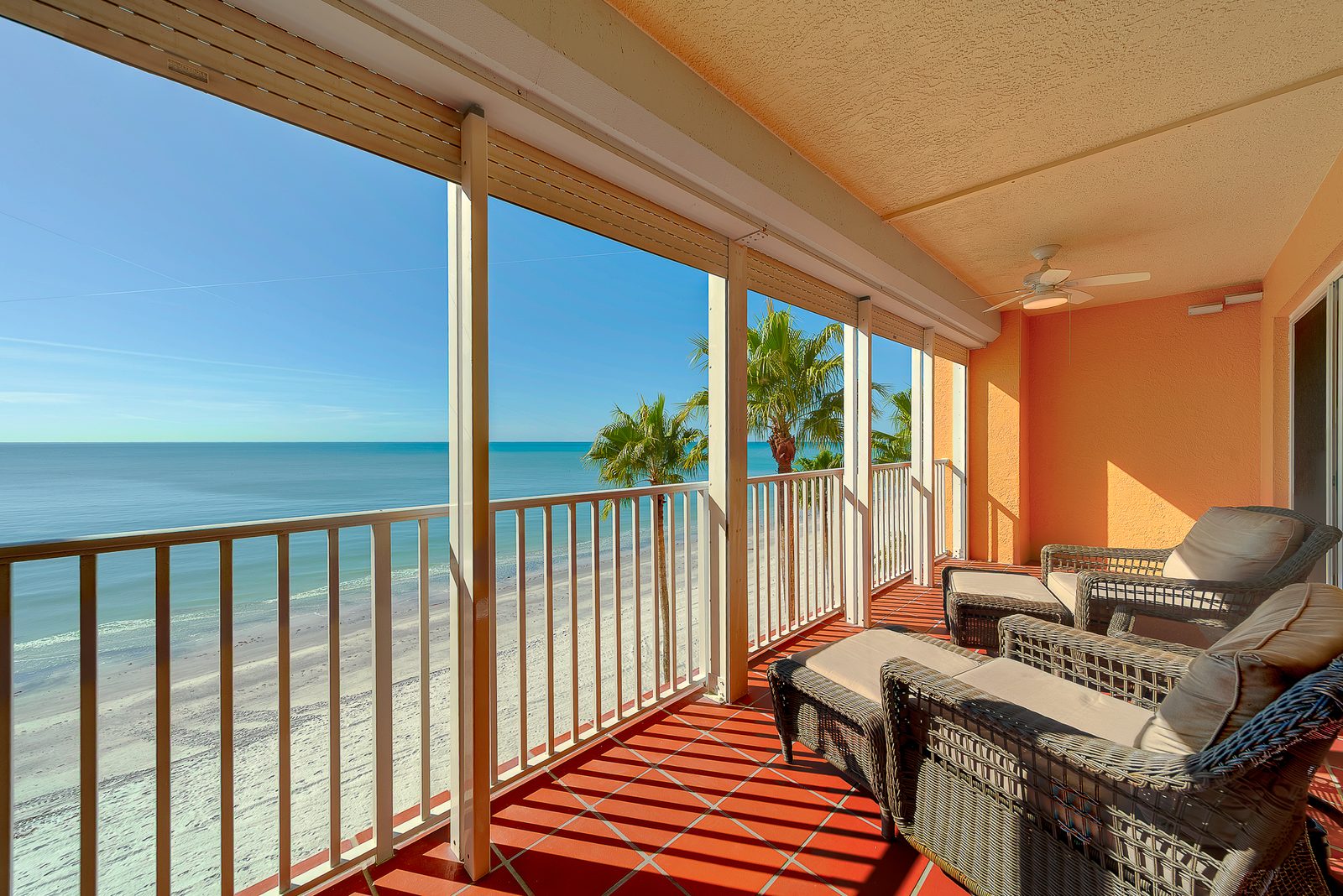 Loungers on the balcony facing the beach